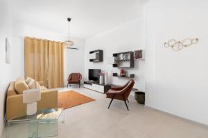 Część wypoczynkowa w obiekcie Ortigia Boutique Plaza Apt