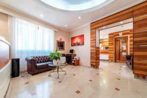 TV a/nebo společenská místnost v ubytování Hotel Riviera Fiumicino