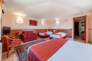 Postel nebo postele na pokoji v ubytování Hotel Riviera Fiumicino