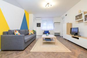 Un televizor și/sau centru de divertisment la HSB Stúdió