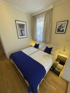 מיטה או מיטות בחדר ב-Gästehaus Gertrude