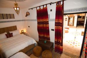 Riad Vis Ta Vie客房内的一张或多张床位