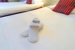 Postel nebo postele na pokoji v ubytování Hotel Ambiotel