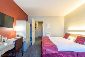 Postel nebo postele na pokoji v ubytování Hotel Ambiotel