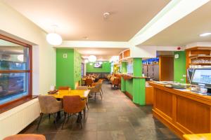 Kuchyň nebo kuchyňský kout v ubytování Hotel Ambiotel