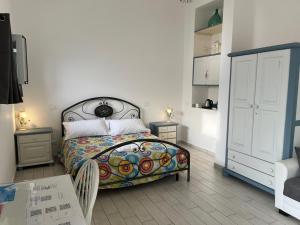 Postel nebo postele na pokoji v ubytování Villa Pecunia
