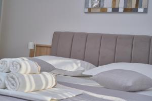 A bed or beds in a room at M Entire floor in a spacious house with pool