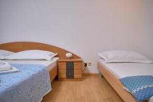 A bed or beds in a room at M Entire floor in a spacious house with pool