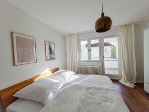 Säng eller sängar i ett rum på Ferienwohnung Maja-Katharina