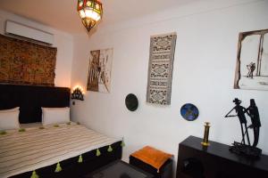 Riad Vis Ta Vie客房内的一张或多张床位