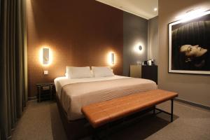 מיטה או מיטות בחדר ב-MiHotel Sala