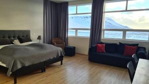 Postel nebo postele na pokoji v ubytování Volcano Hotel