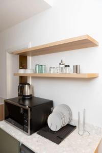 Φωτογραφία από το άλμπουμ του grey l studio apartments Downtown Cairo Ouzonian House στο Κάιρο