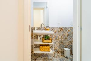 Koupelna v ubytování Via Malta Cozy Apartments near Ortigia