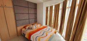 Postel nebo postele na pokoji v ubytování TreeParkCity apartments by WinsHome