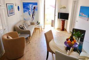 TV a/nebo společenská místnost v ubytování Apartment Maestral