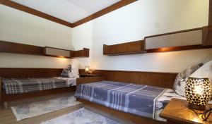 Posteľ alebo postele v izbe v ubytovaní Appartements MAGLOV