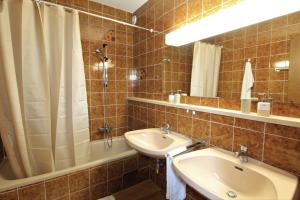 Kúpeľňa v ubytovaní Appartements MAGLOV