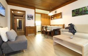 Posedenie v ubytovaní Appartements MAGLOV