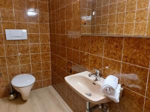 Kúpeľňa v ubytovaní Appartements MAGLOV