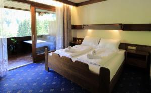 Posteľ alebo postele v izbe v ubytovaní Appartements MAGLOV