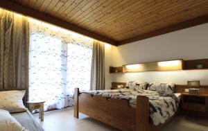 Posteľ alebo postele v izbe v ubytovaní Appartements MAGLOV