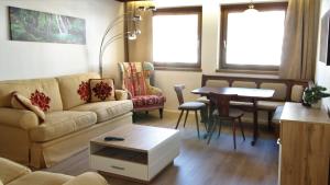 Posedenie v ubytovaní Appartements MAGLOV