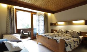 Posteľ alebo postele v izbe v ubytovaní Appartements MAGLOV