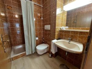 Kúpeľňa v ubytovaní Appartements MAGLOV