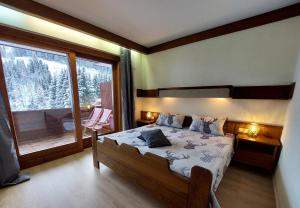 Posteľ alebo postele v izbe v ubytovaní Appartements MAGLOV