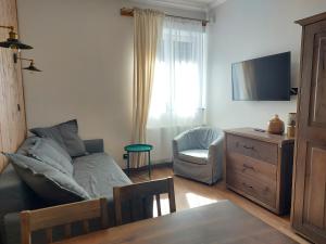 Posezení v ubytování 4 STRONY ŚWIATA Pokoje i Apartamenty