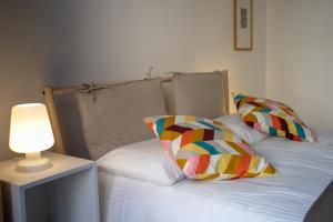 A bed or beds in a room at VITTORIO EMANUELE HOUSE