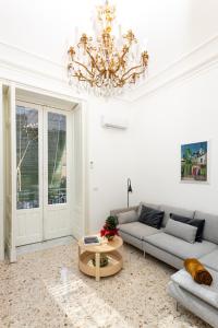 A seating area at VITTORIO EMANUELE HOUSE