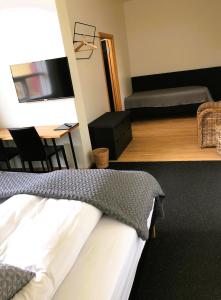Postel nebo postele na pokoji v ubytování Volcano Hotel