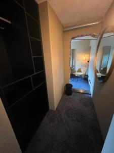 Postel nebo postele na pokoji v ubytování Hotel Oostereiland