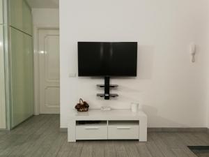 A television and/or entertainment centre at Domus Deiana