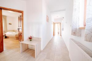 Postel nebo postele na pokoji v ubytování Villa Alma