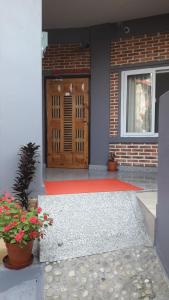 Muka bangunan atau pintu masuk Beli Guest House