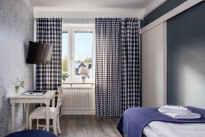 Voodi või voodid majutusasutuse Hotel Vännäs toas