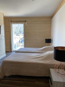 Posteľ alebo postele v izbe v ubytovaní Chalet Jersey