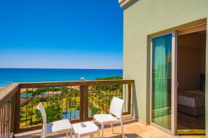 a balcony with a view of the ocean at Royal Atlantis Spa & Resort in Side