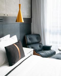 Postel nebo postele na pokoji v ubytování 42 Hotel Williamsburg