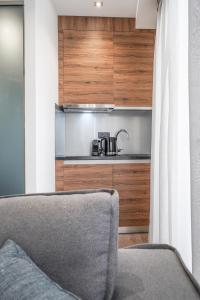 Kuchyňa alebo kuchynka v ubytovaní Stylish Living-Parthenon + 12 fotografií