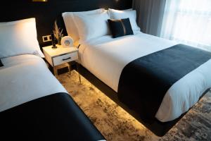 Postel nebo postele na pokoji v ubytování 42 Hotel Williamsburg