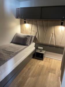 Postel nebo postele na pokoji v ubytování Mobile Home Jana