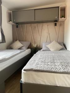 Postel nebo postele na pokoji v ubytování Mobile Home Jana