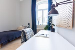 Letto o letti in una camera di Holterman Hostel