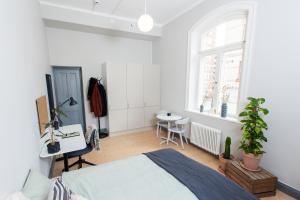 Letto o letti in una camera di Holterman Hostel