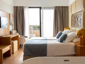 Cama ou camas em um quarto em Alexandre Grand Teguise Playa