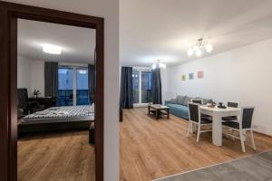 Posedenie v ubytovaní Waw Apartamenty Manhattan